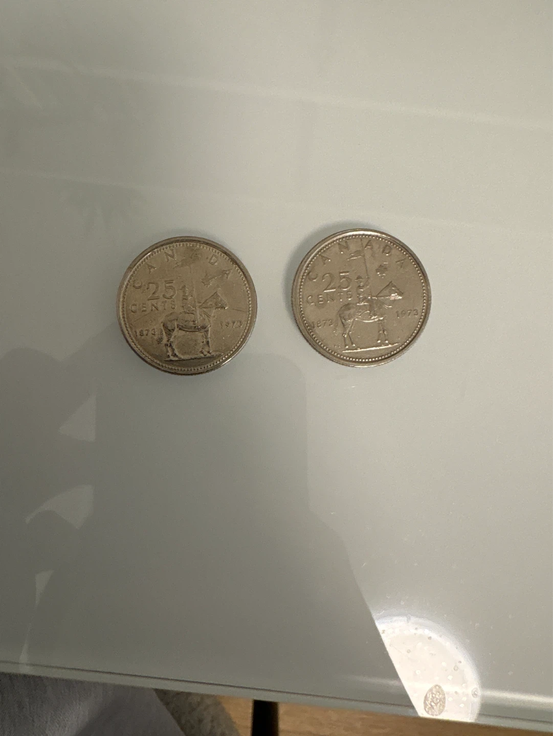 Two 1973 Canadian 25 Cent Coins