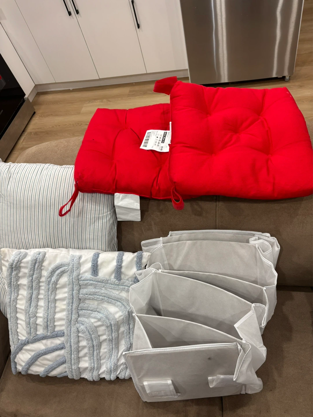 Red Tufted Seat Cushions and Grey Fabric Organizers