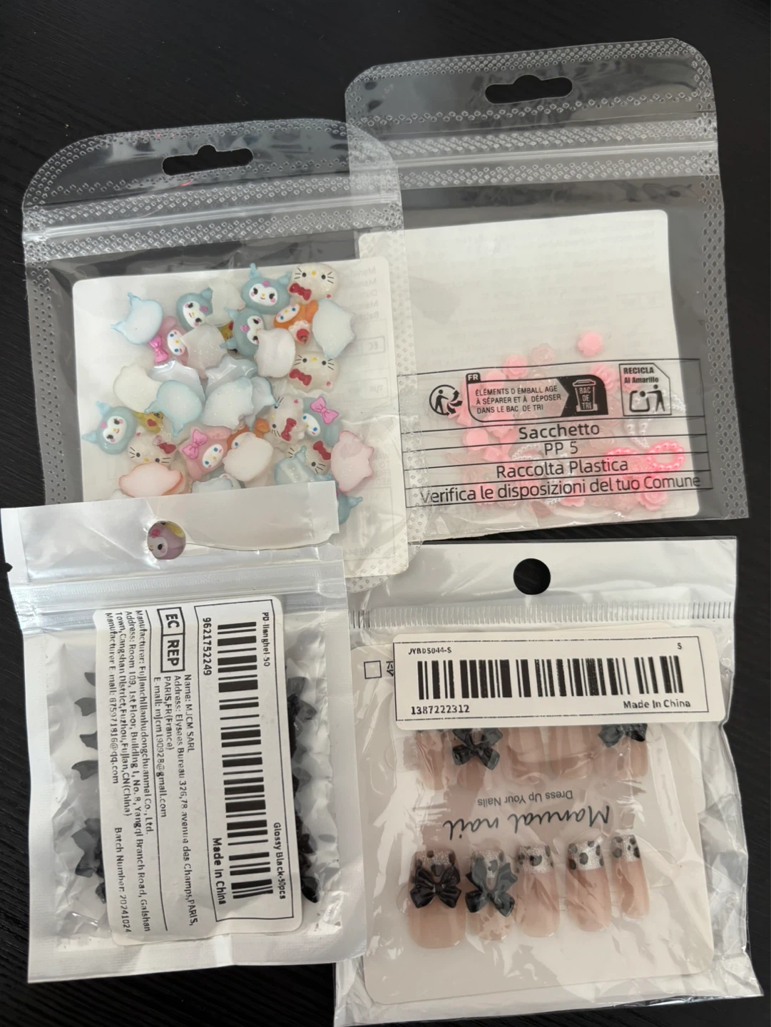 Assorted Nail Art Charms and Press-On Nails