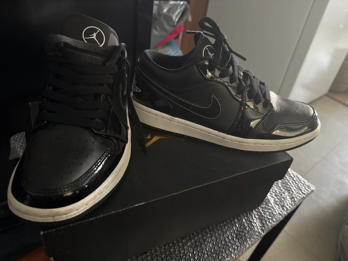 Air Jordan 1 Low Black Patent Leather Sneakers