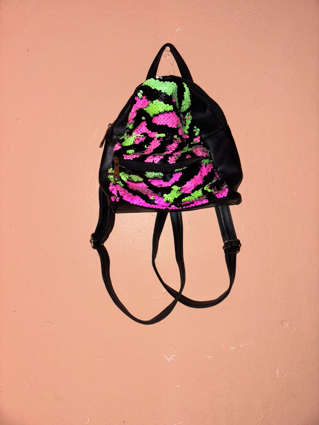 Black backpack with reversible sequins
