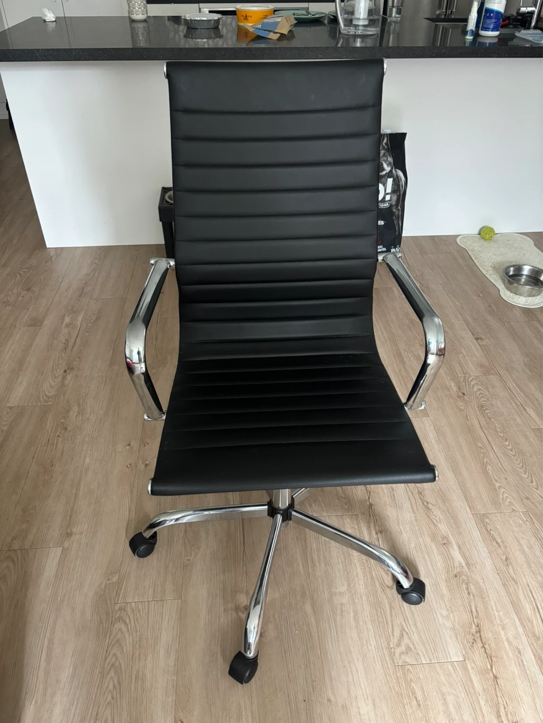 Black office chair with chrome accents