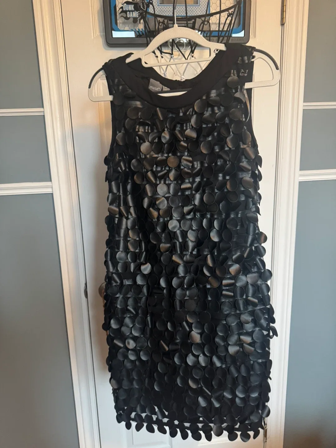 Black Sleeveless Dress with Disc Embellishment