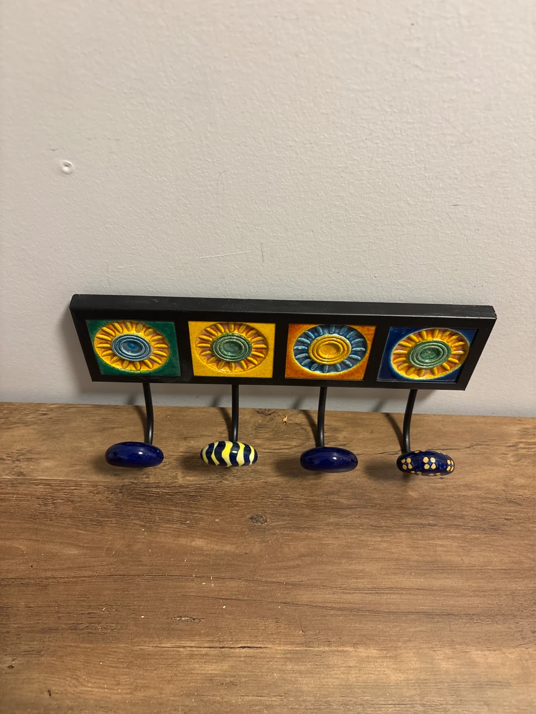 Decorative Wall Hook Rack with Ceramic Sun Designs - photo 2