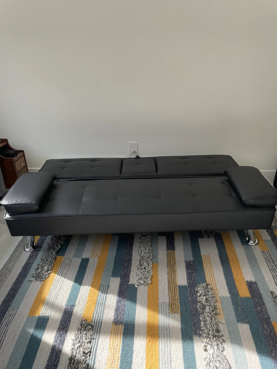 Black Faux Leather Futon Sofa Bed in Pristine Condition - photo 3