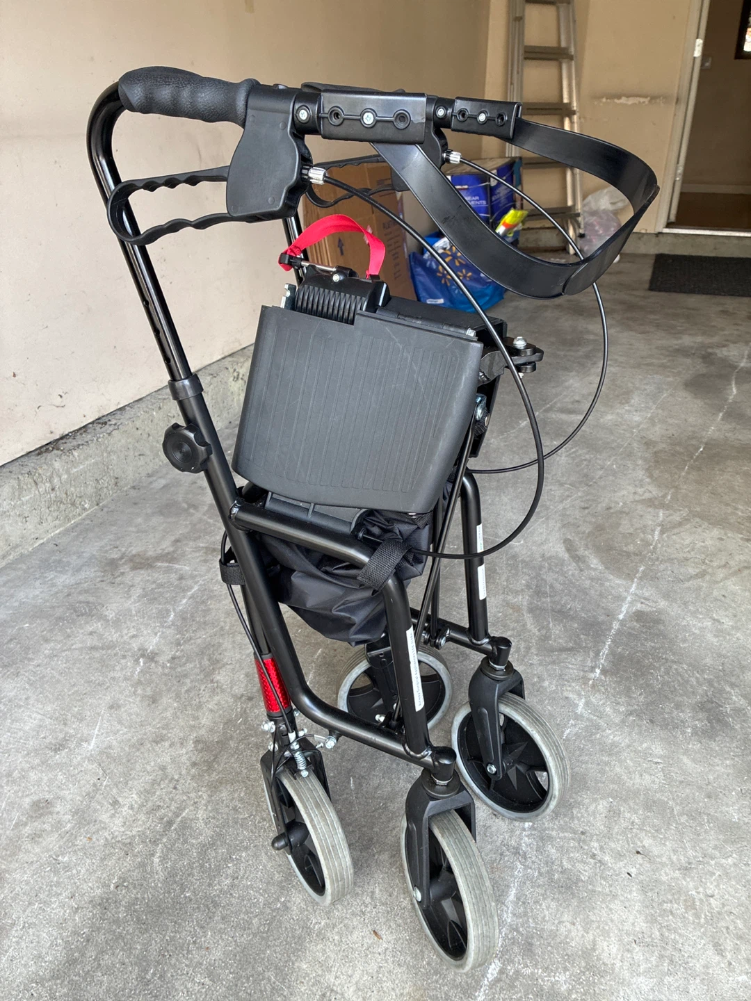 Black 4-Wheel Walker with Seat and Brakes