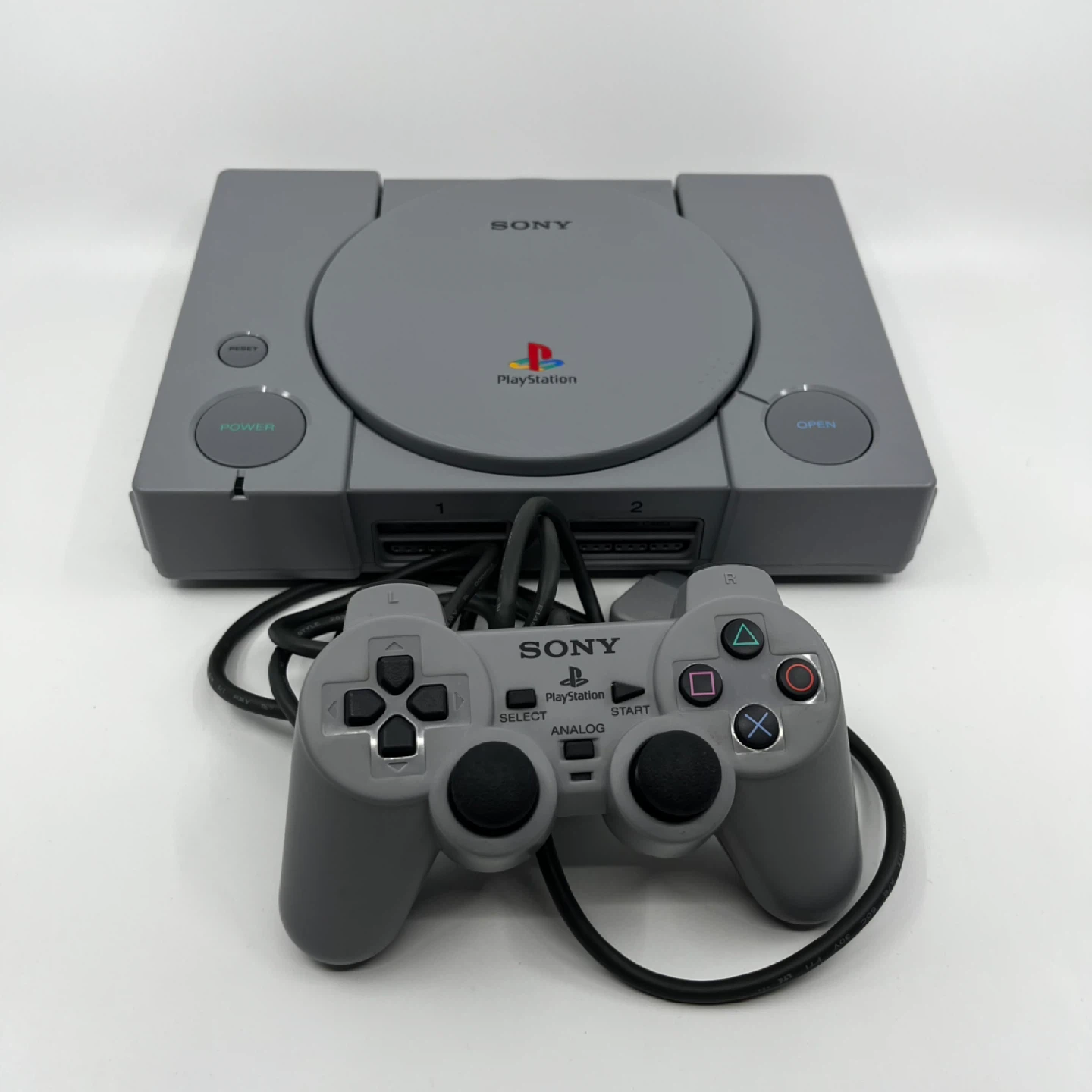 Sony PlayStation 1 (PS1) Console with Controller and Cables