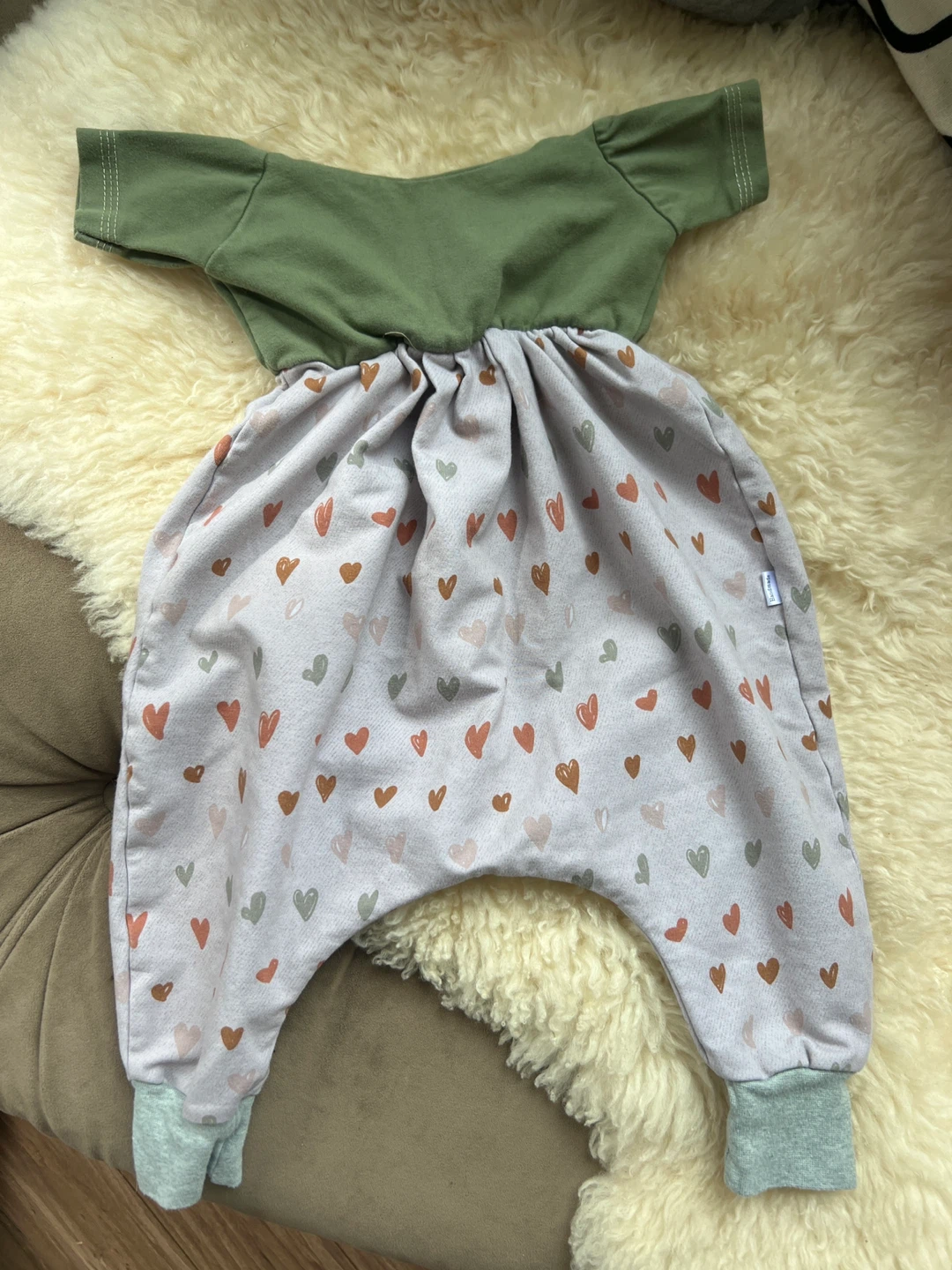 Adorable, handmade baby romper