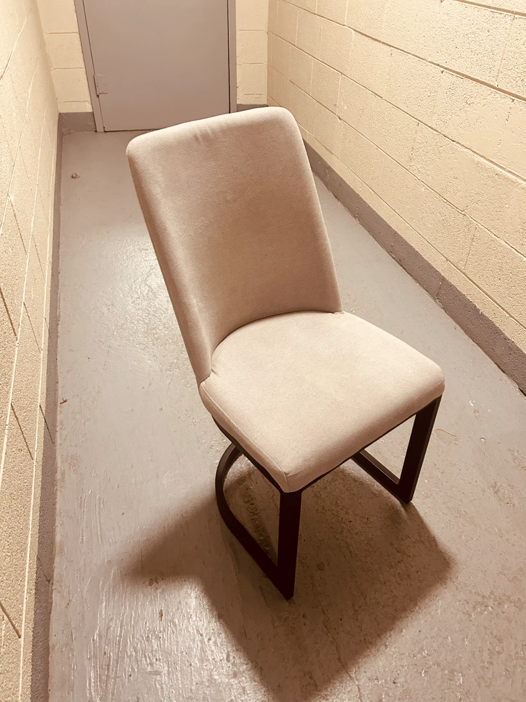 Grey Upholstered Chair with Black Metal Frame