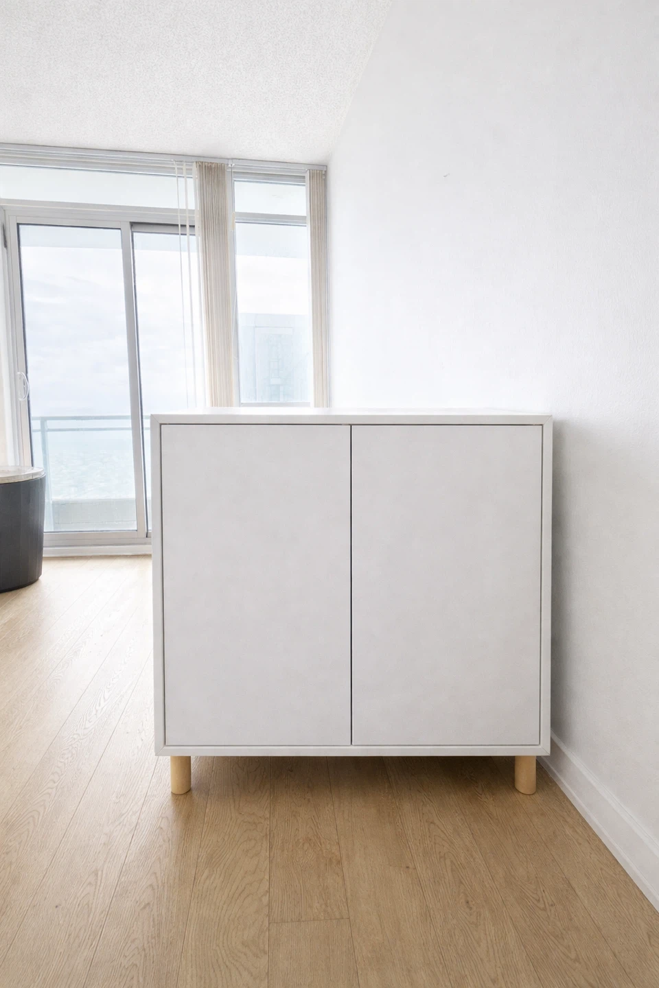 IKEA White Storage Cabinet with Wooden Legs