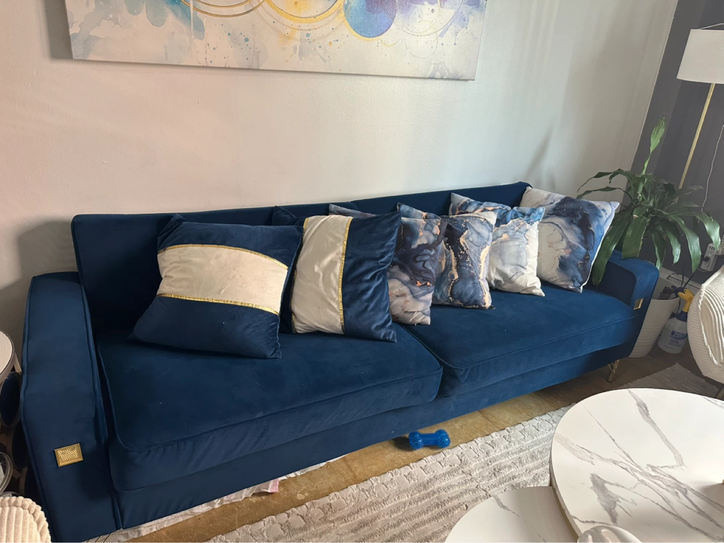 Deep Blue Velvet Sofa with Gold Accents