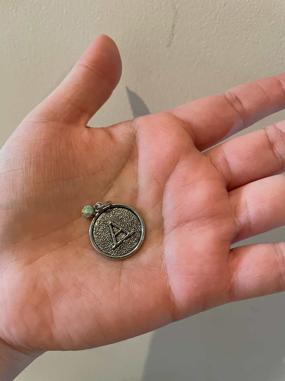 Pendant with the letter A