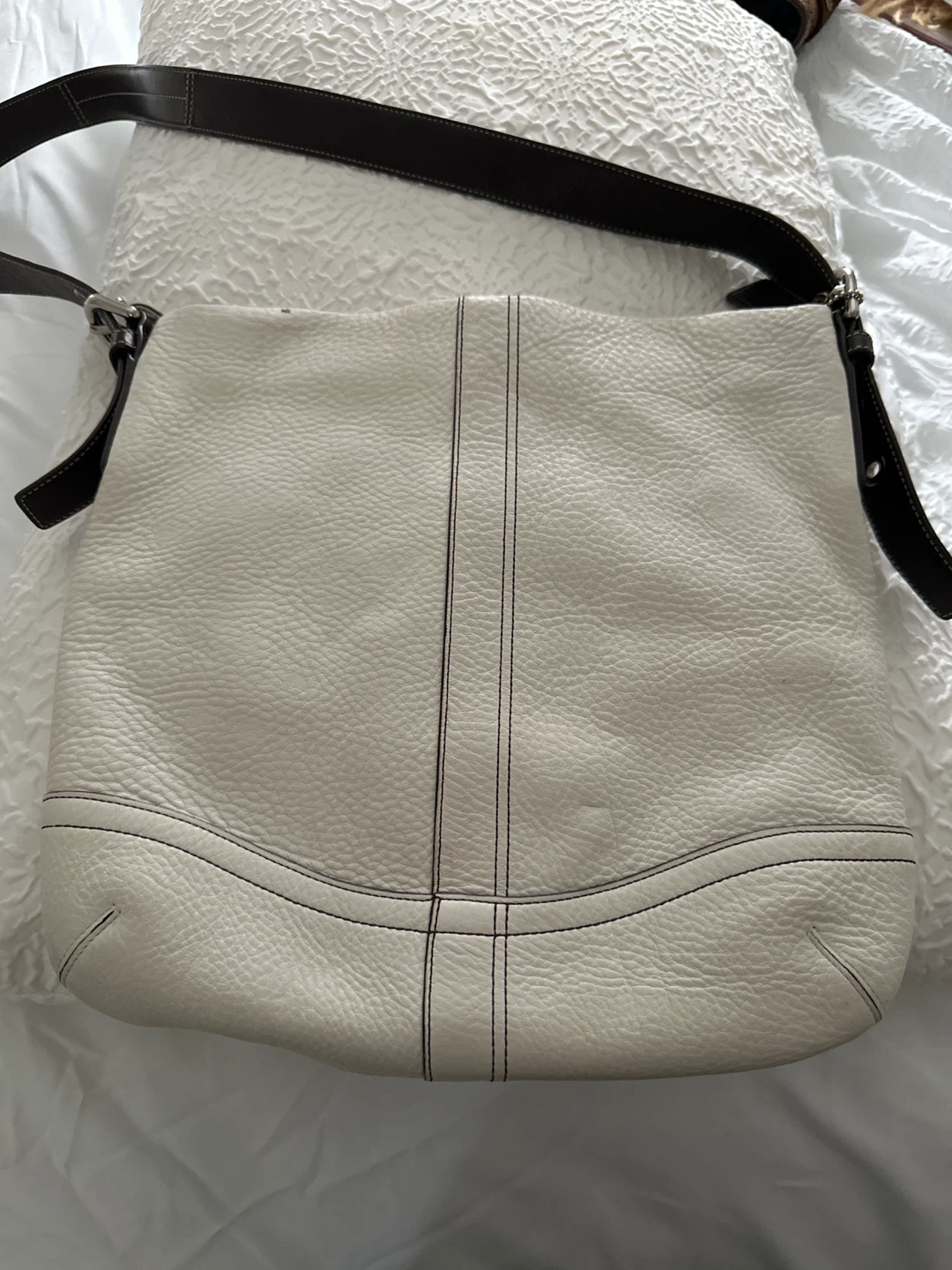 Coach white leather purse.