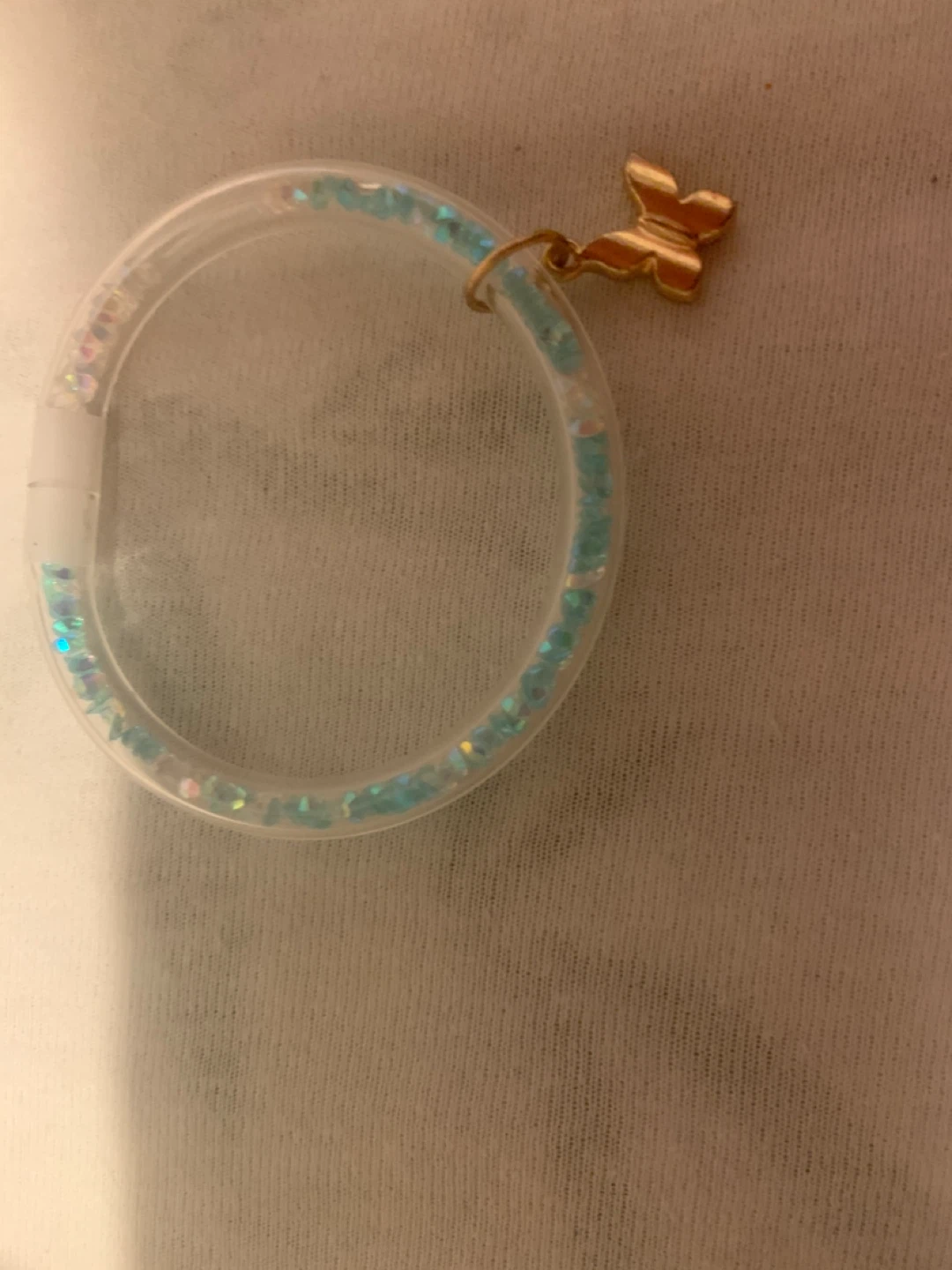 Clear bracelet with blue and pink glitter and butterfly charm - photo 2