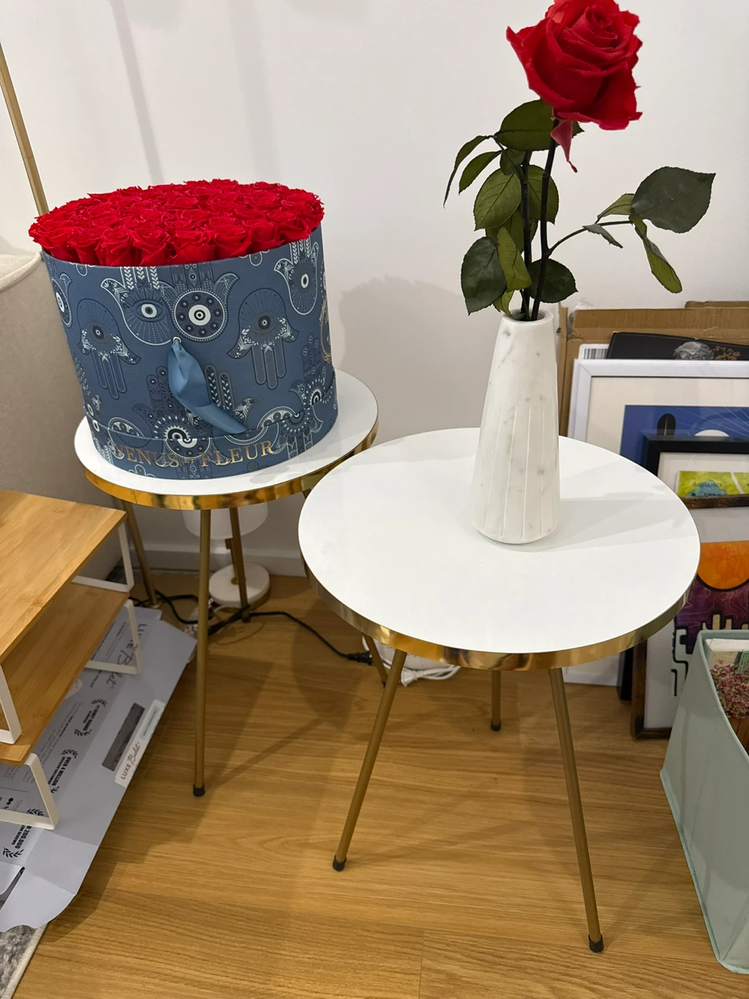 Two white round tables gold legs