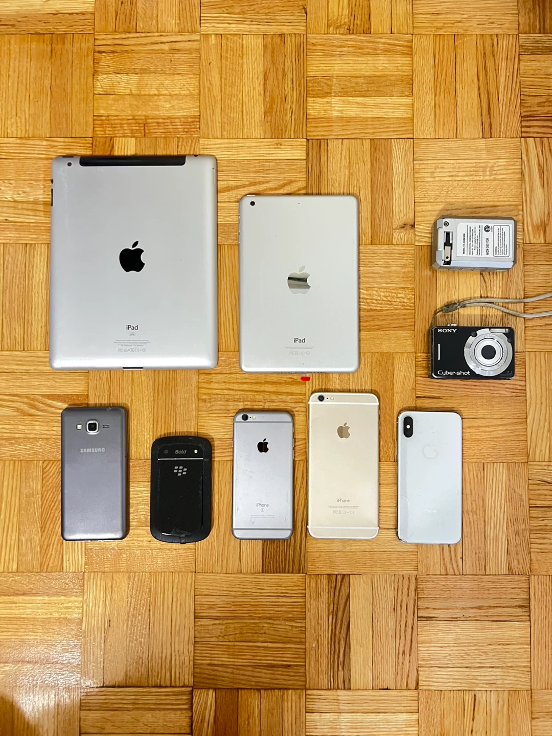 Assorted Apple, Samsung, BlackBerry, and Sony Electronics