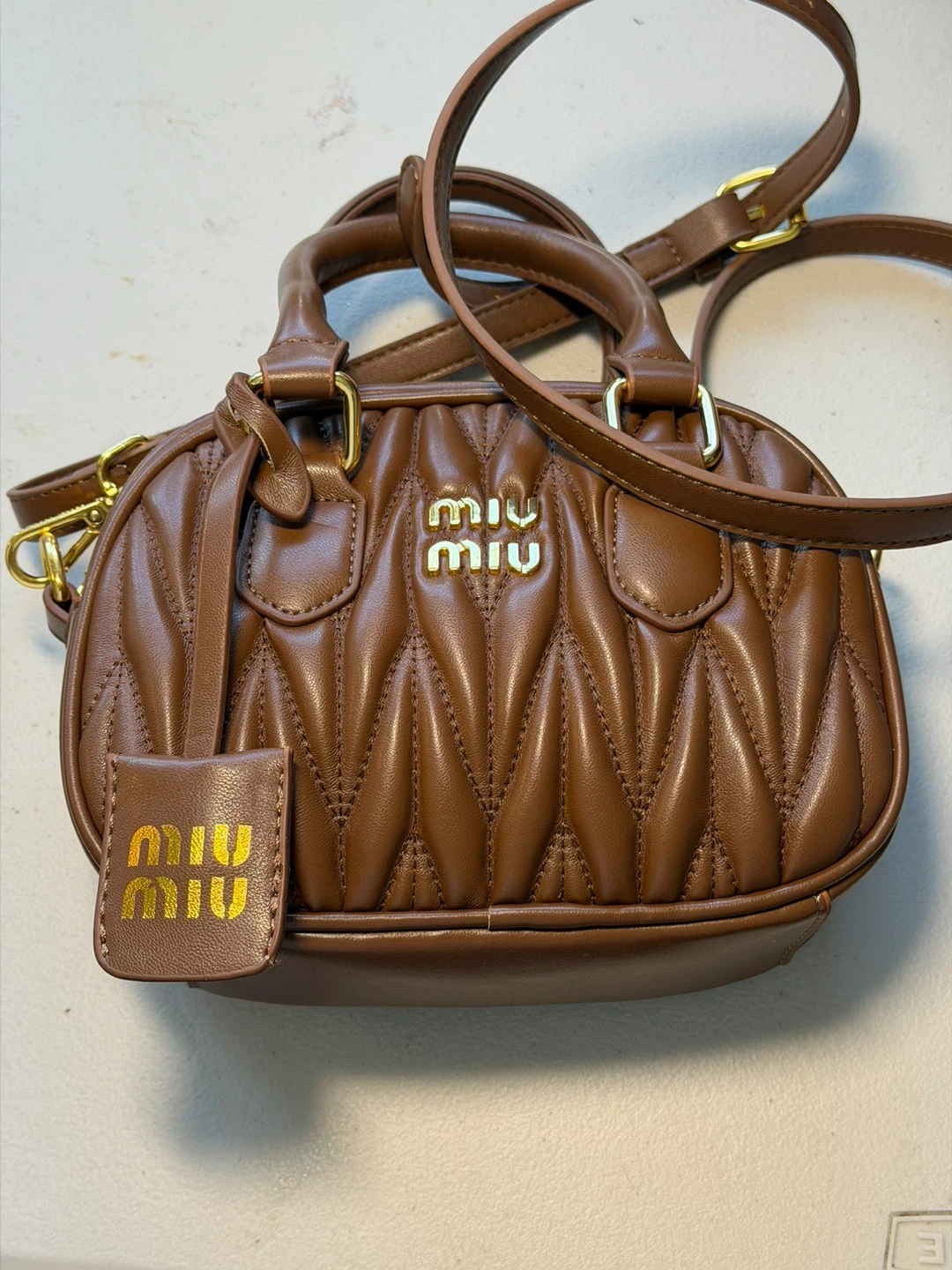 Miu Miu Quilted Leather Mini Bag - photo 3