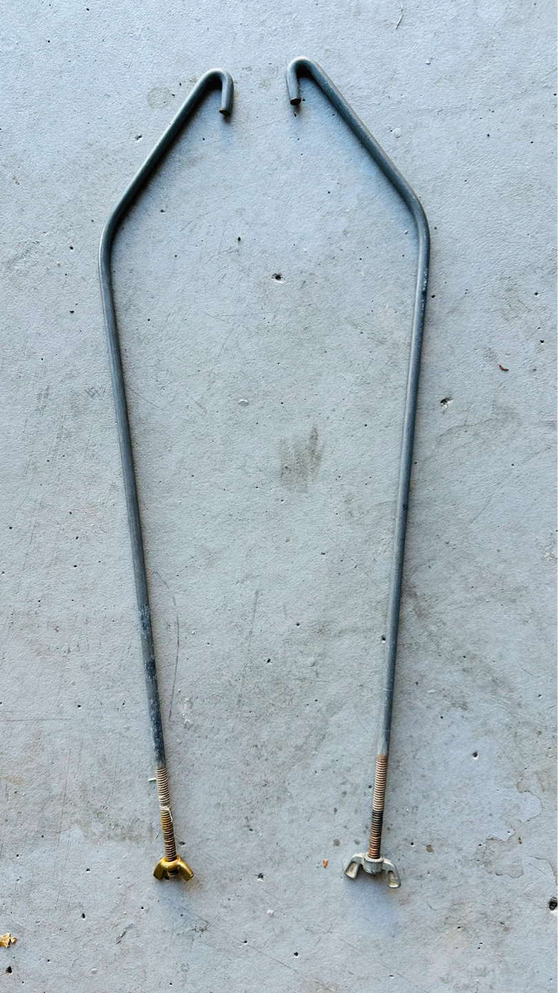 Single propane tank holding rods for RV