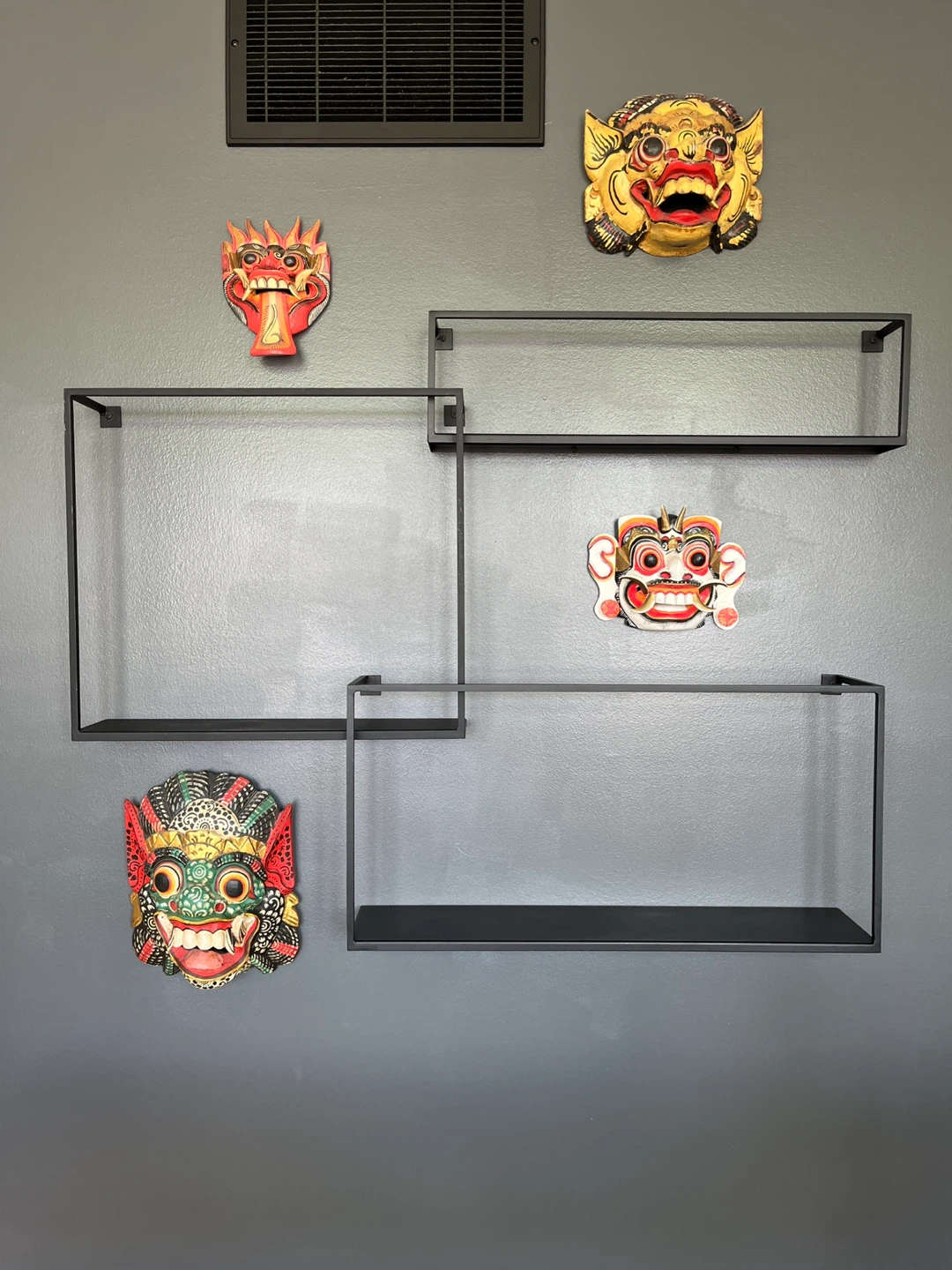 CB2 matte black metal wall shelves (3 pieces)