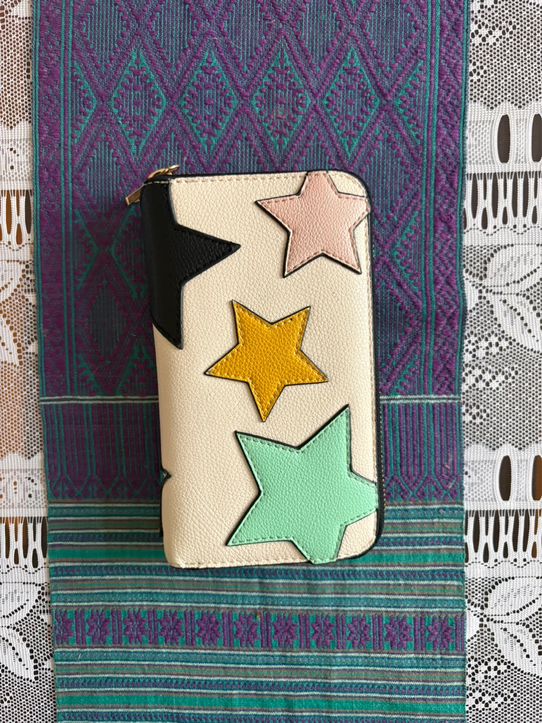 Cream coloured wallet with star appliques