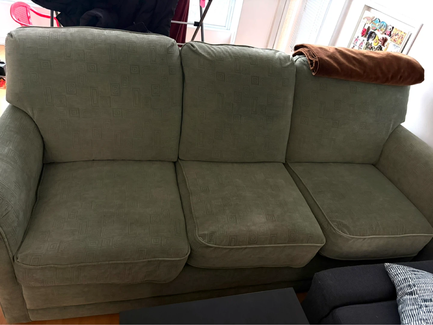 Green Lazyboy three seater couch