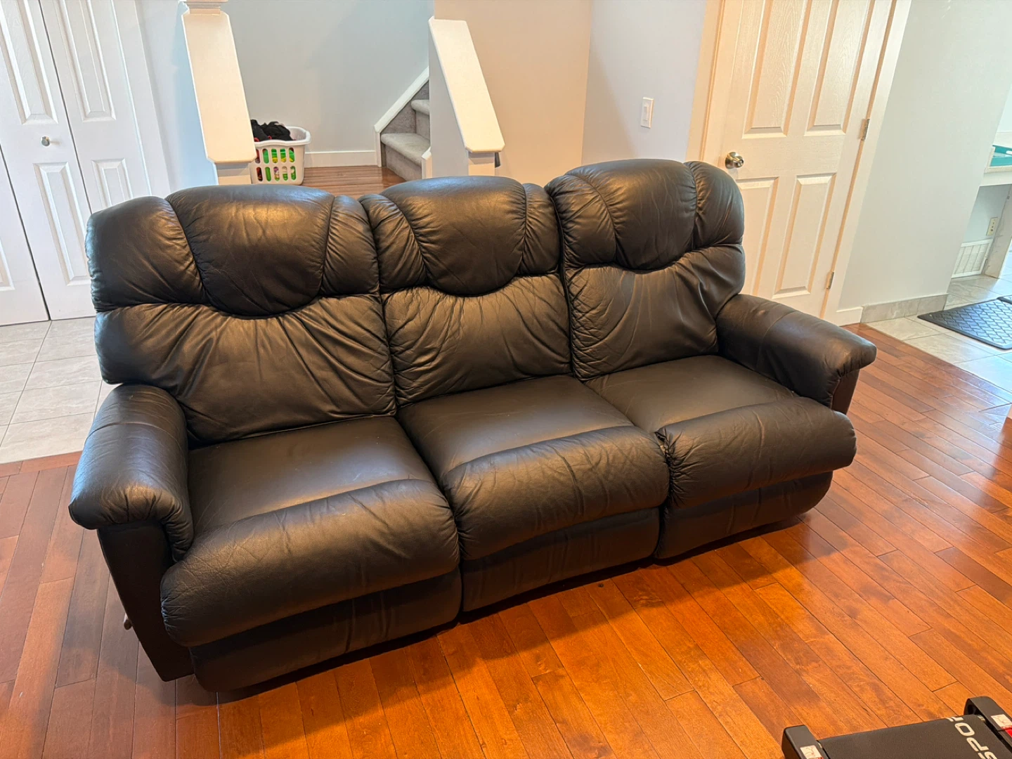 Black Leather Reclining Sofa