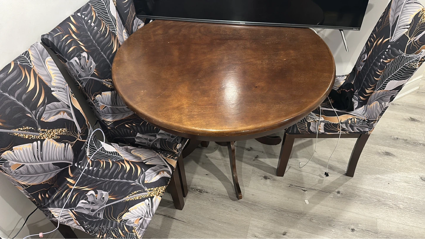 Round Wooden Table with Four Tropical Print Chair Covers - photo 4