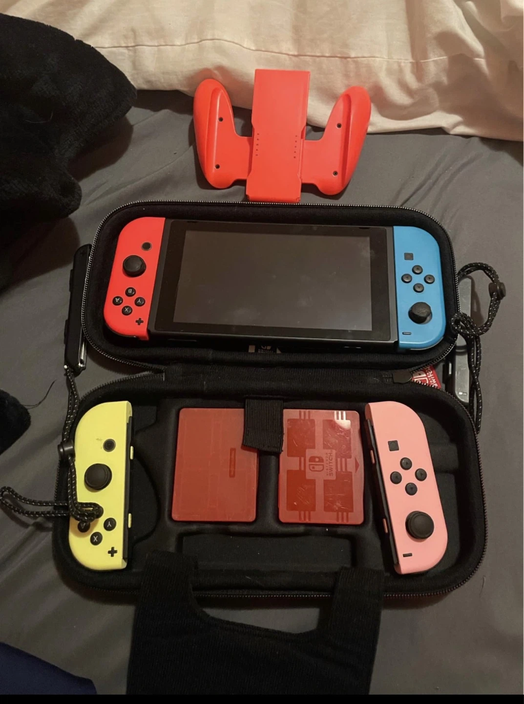 Nintendo Switch Console with Neon Red and Blue Joy-Cons