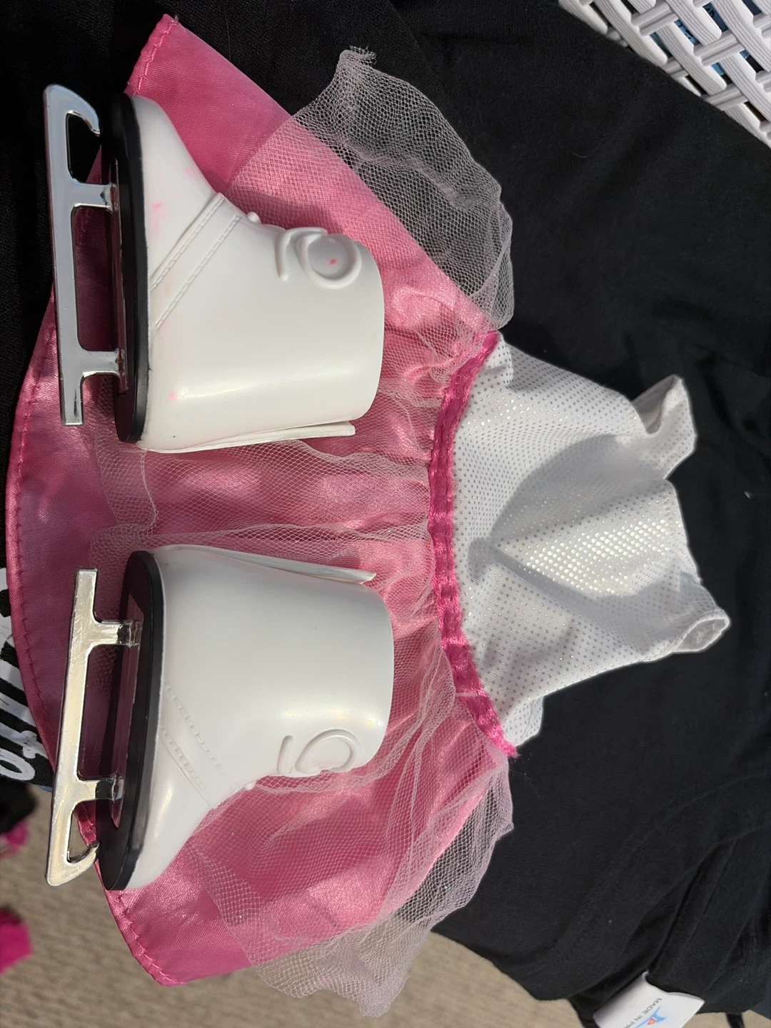 White ice skates with pink tutu outfit