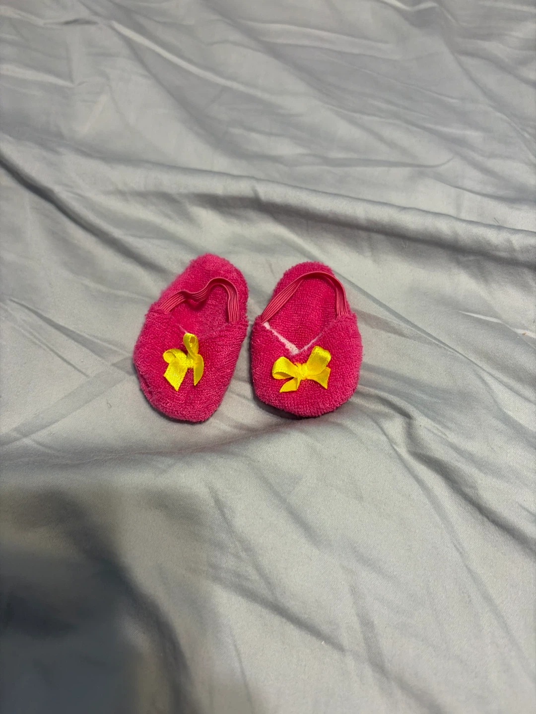Pair of Pink Plush Doll Shoes with Yellow Bows