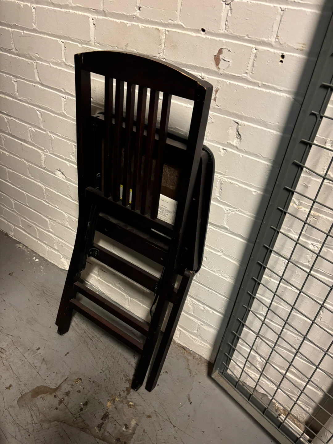 Two Dark Wood Folding Chairs with Black Padded Seat - photo 4