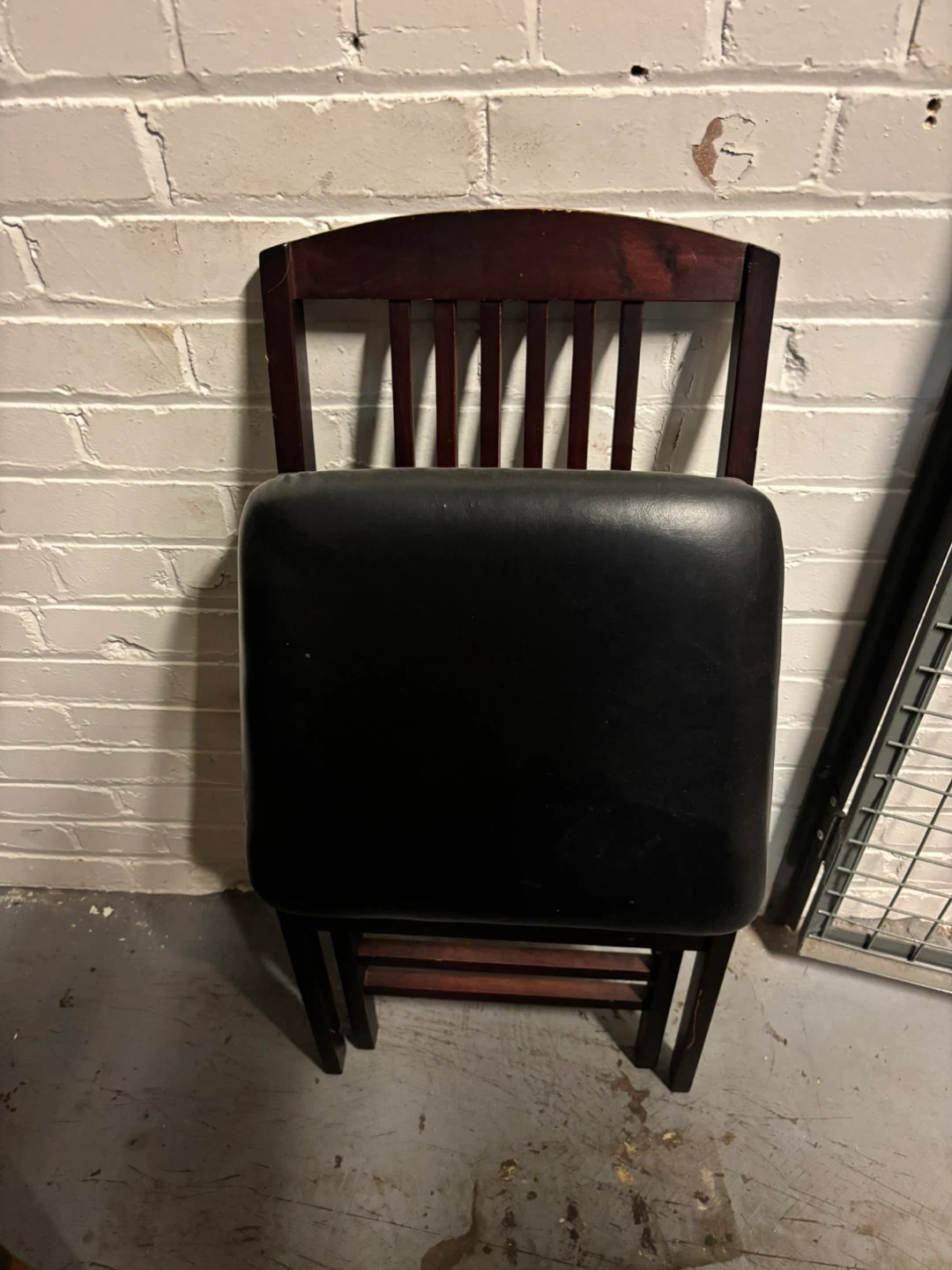 Two Dark Wood Folding Chairs with Black Padded Seat - photo 2