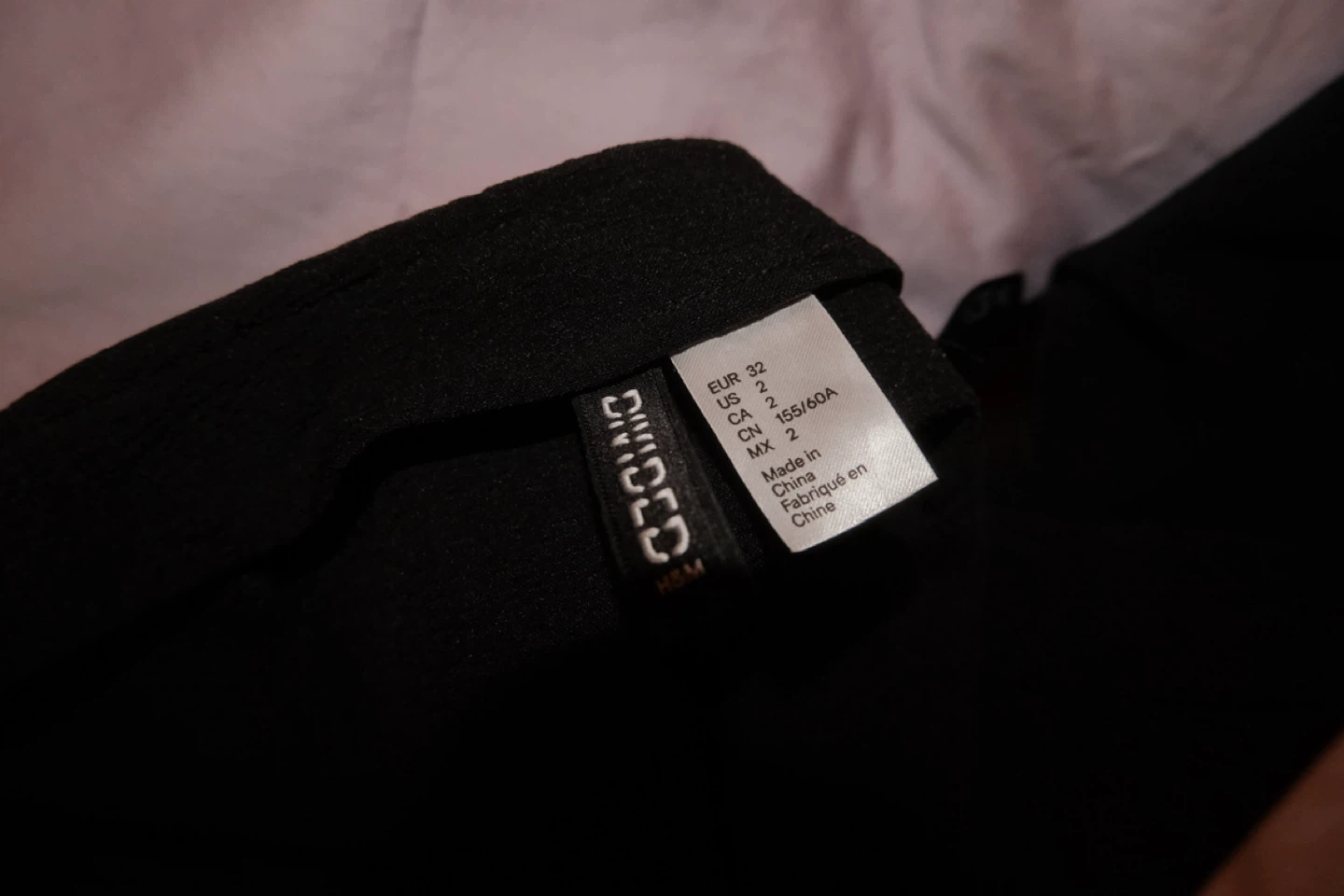 H&M Black Mini Skirt with Ruffle Hem - Size 2
