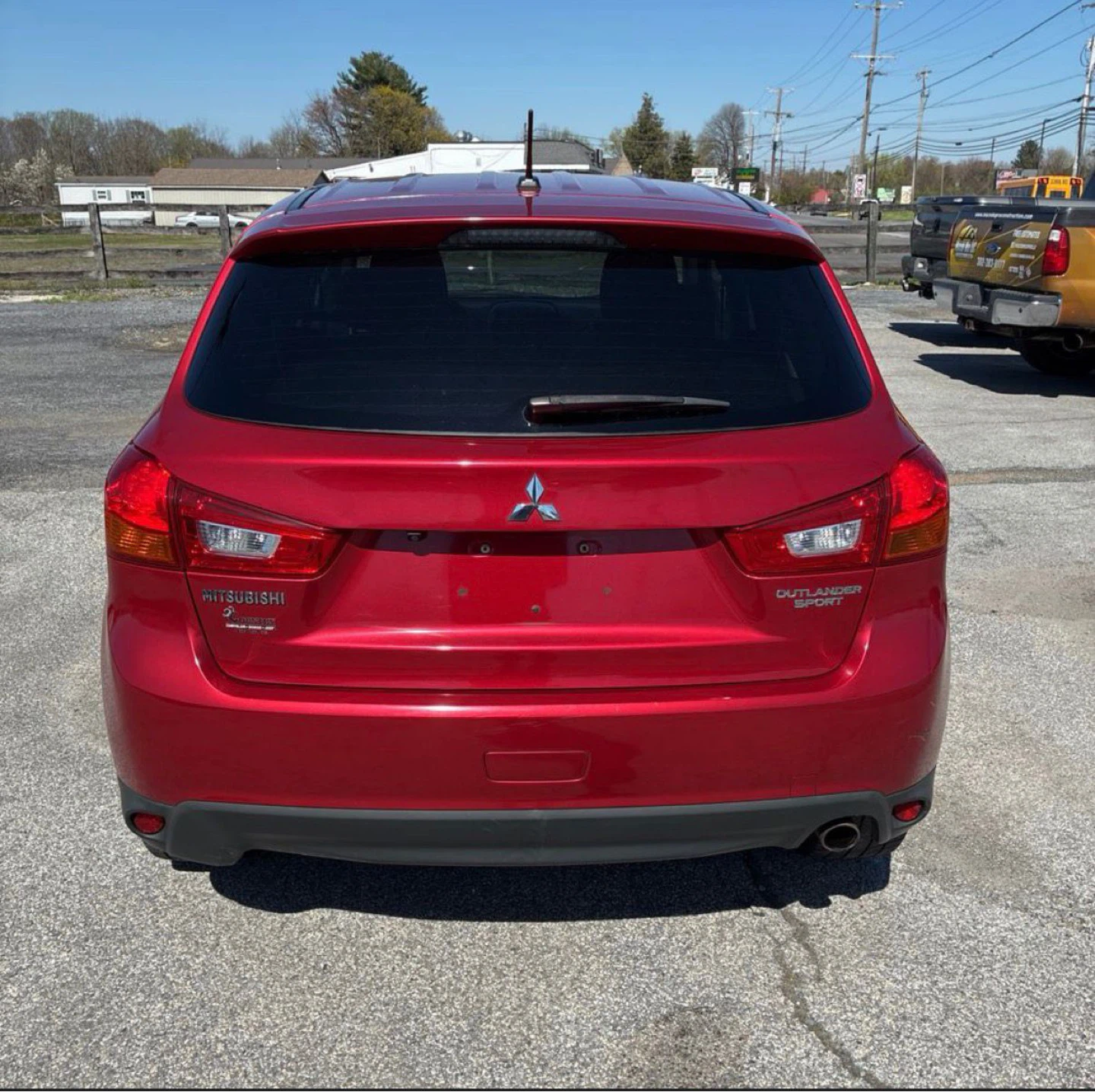 Red Mitsubishi Outlander Sport - photo 3