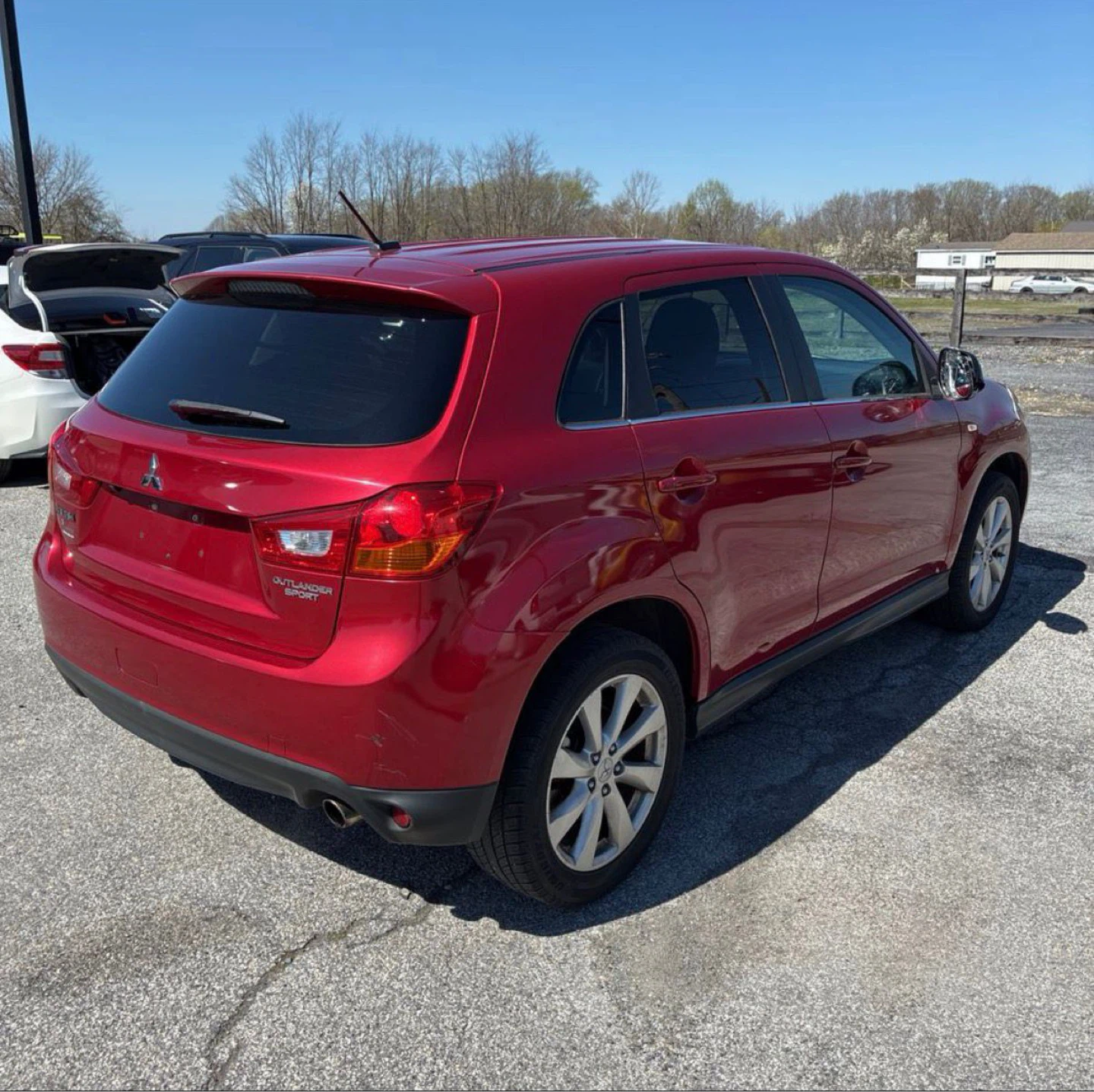 Red Mitsubishi Outlander Sport - photo 2