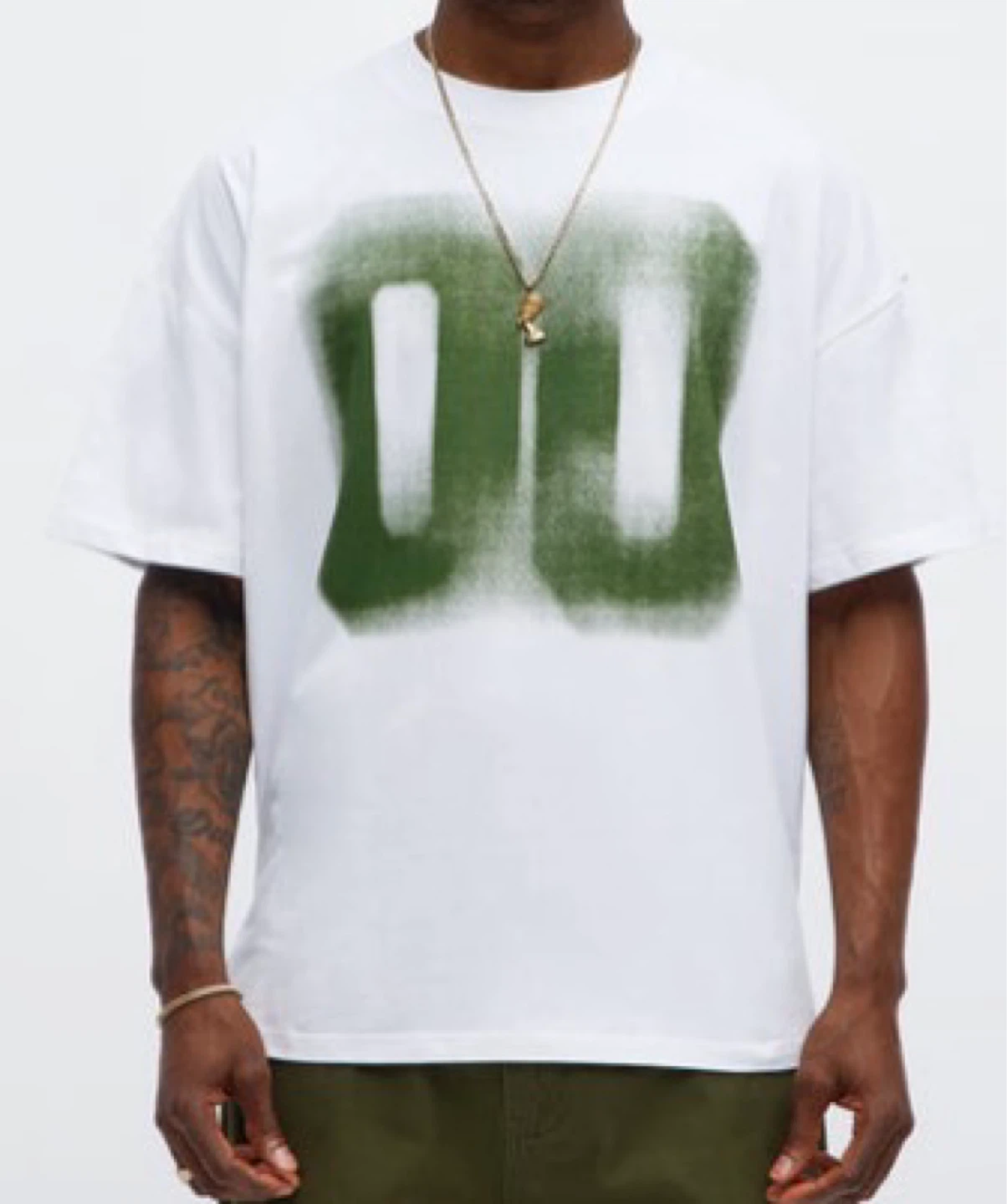 White T-Shirt with Green Graphic