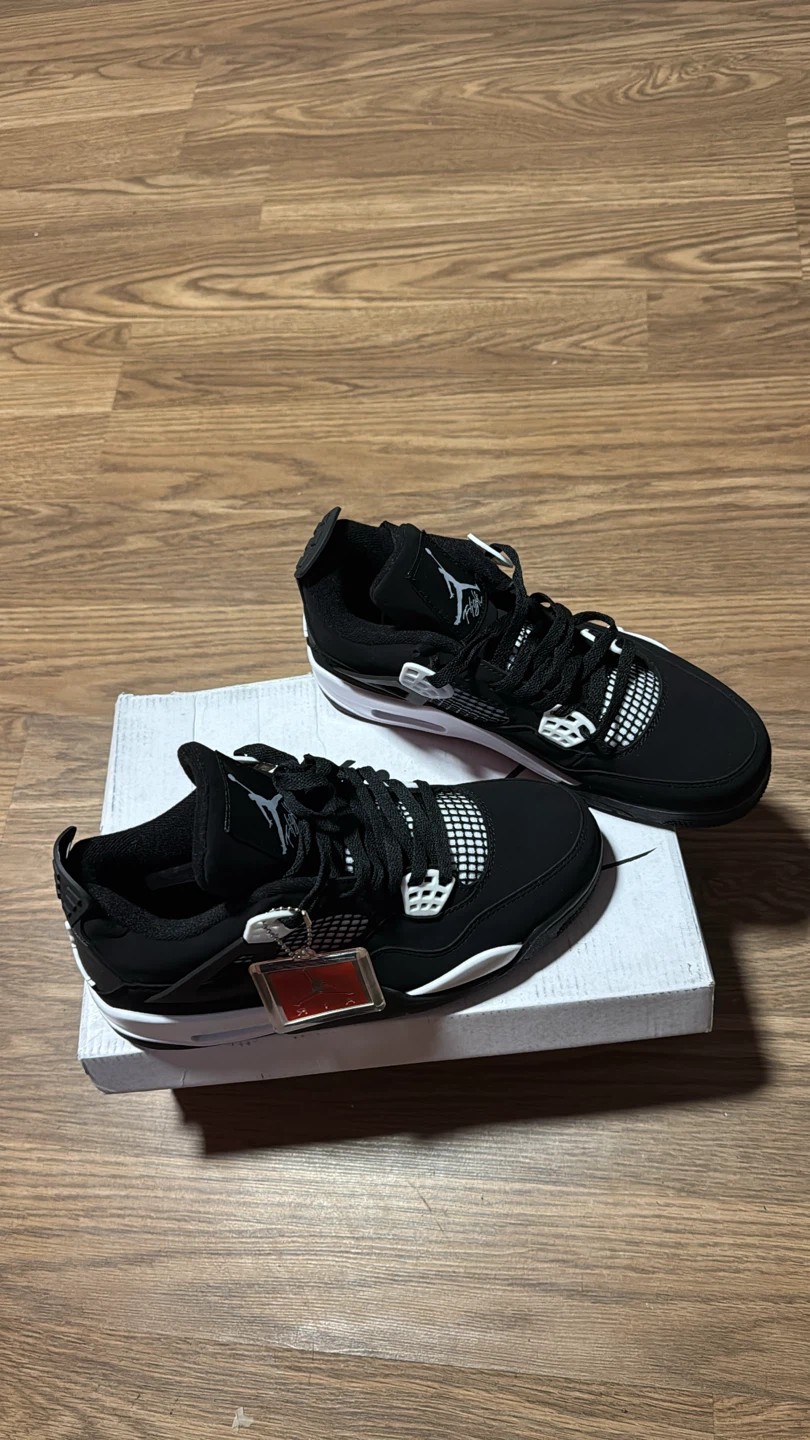 Air Jordan 4 Retro Black White Sneakers - photo 2