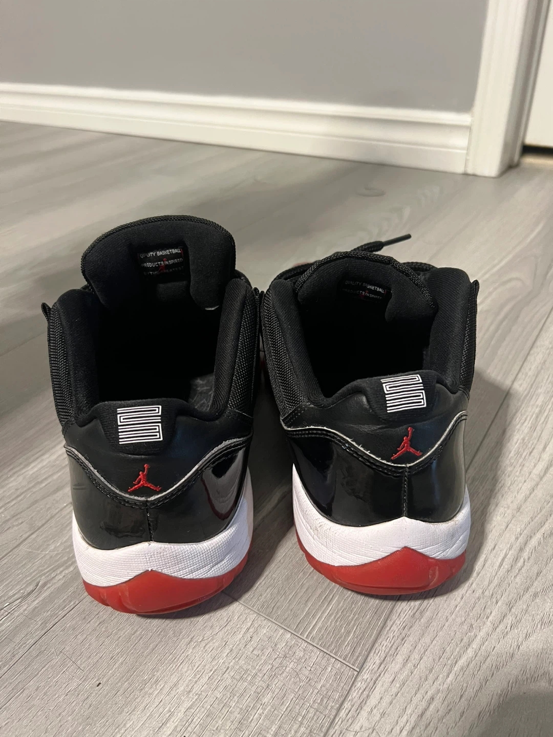 Air Jordan 11 Retro Low Black Red White Sneakers - photo 2