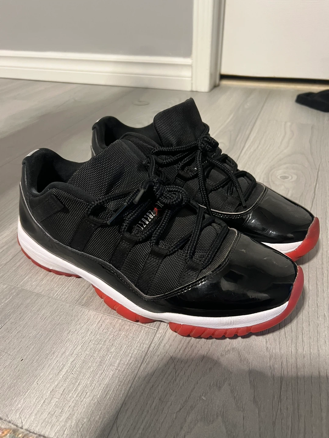 Air Jordan 11 Retro Low Black Red White Sneakers