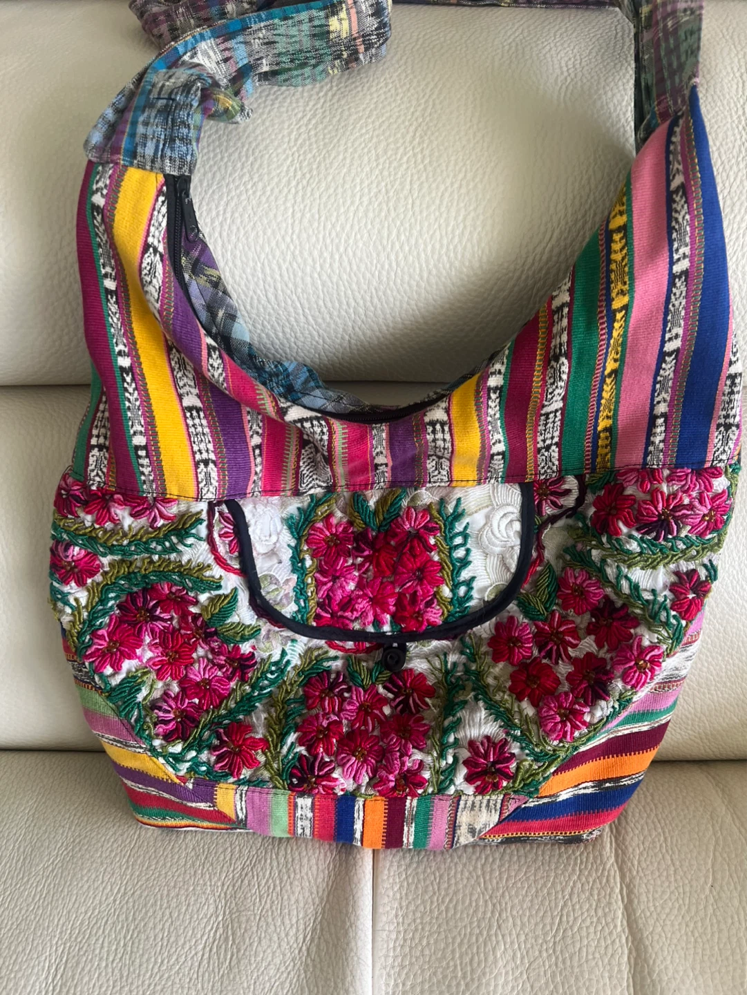 Hand-knitted bags  with embroidered flowers