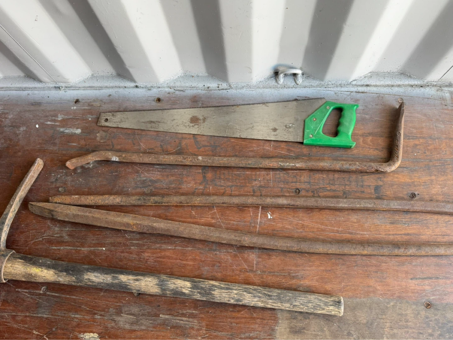 Assorted Hand Tools: Pickaxe, Saw, Pry Bars - photo 3