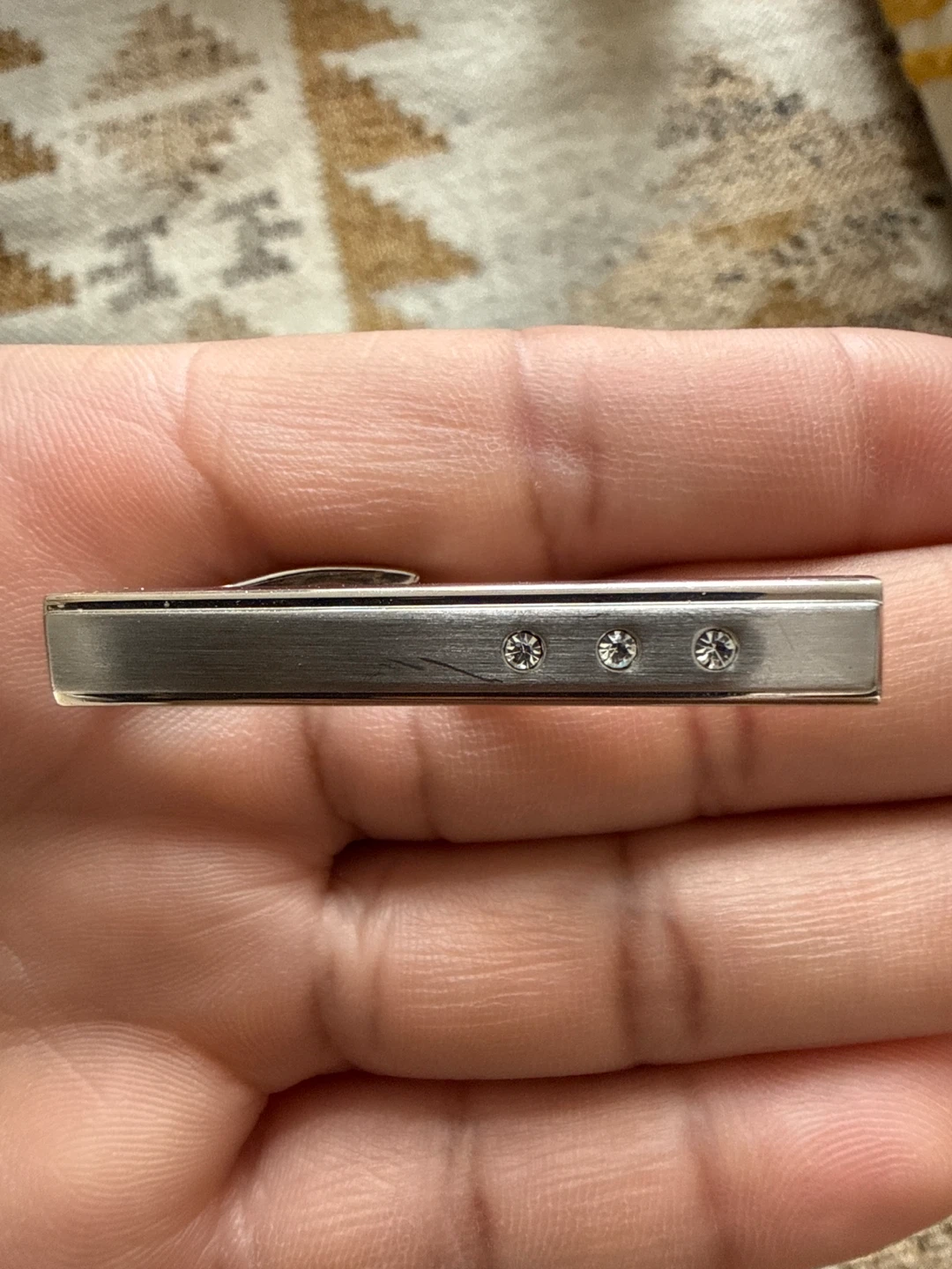 Silver-tone tie clip with three crystals