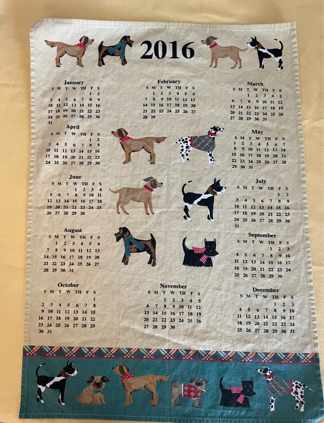 Ulster Weavers 2016 Dog Calendar Tea Towel