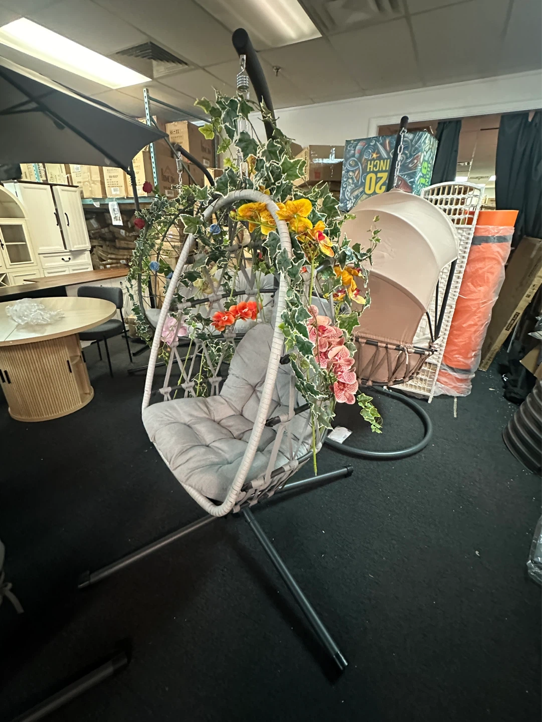 Hanging Egg Chair with Grey Cushion and Faux Greenery