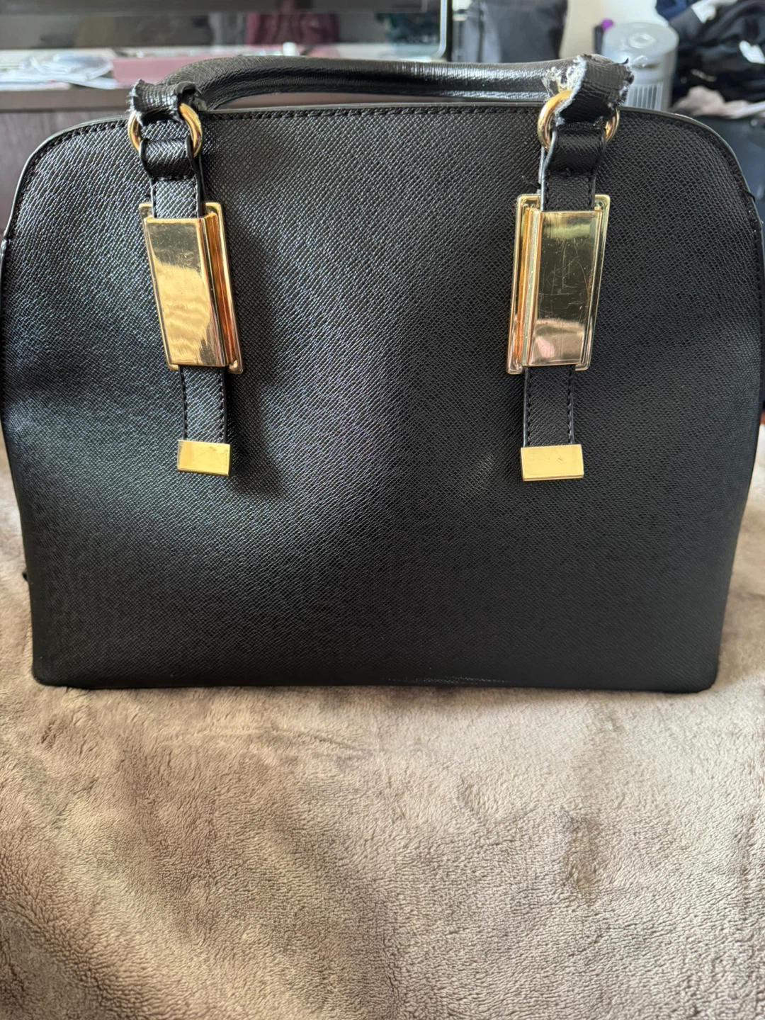 Black Handbag with Gold Accents