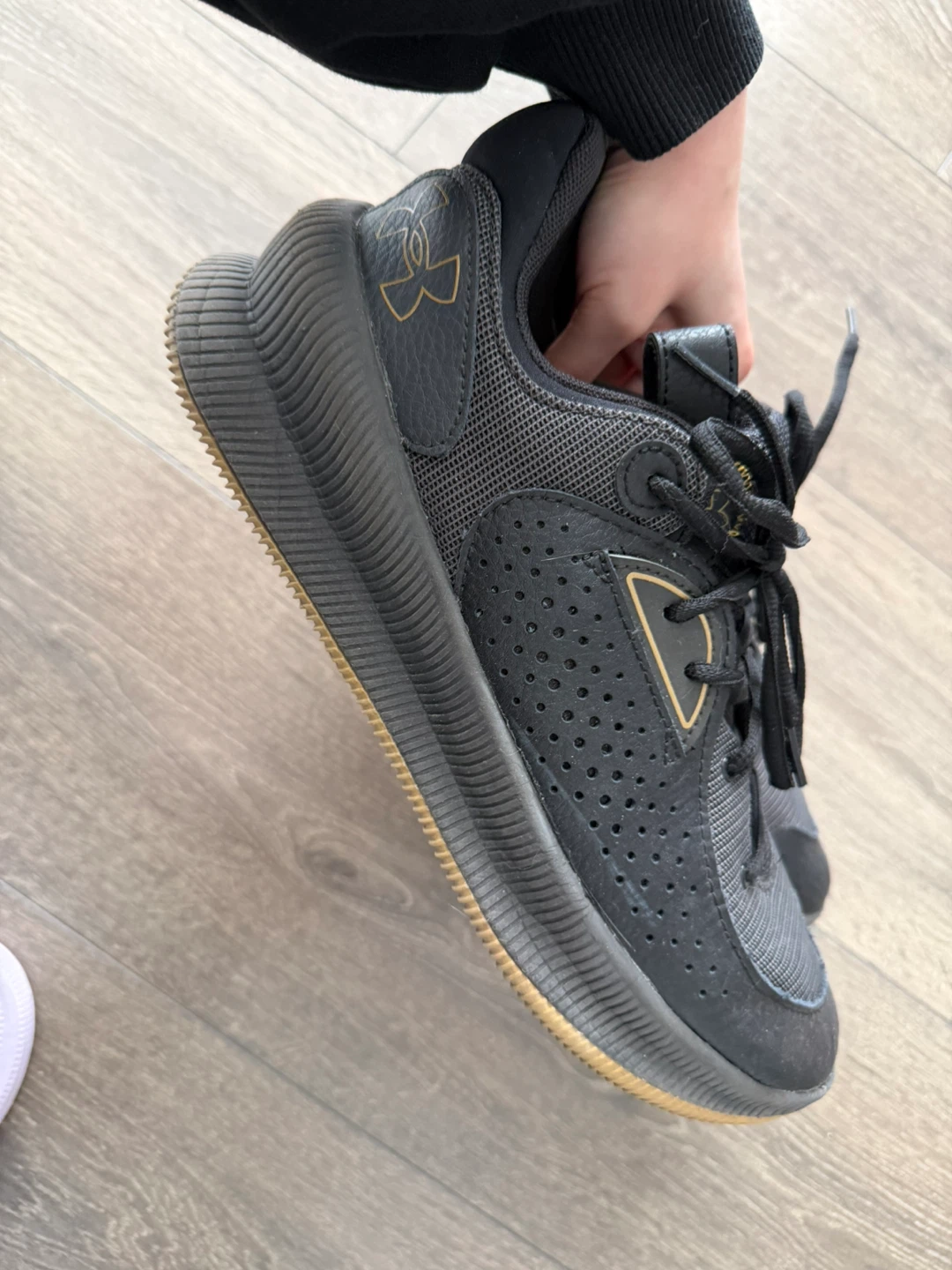 size 10.5 Under Armour Black & Gold Athletic Shoes