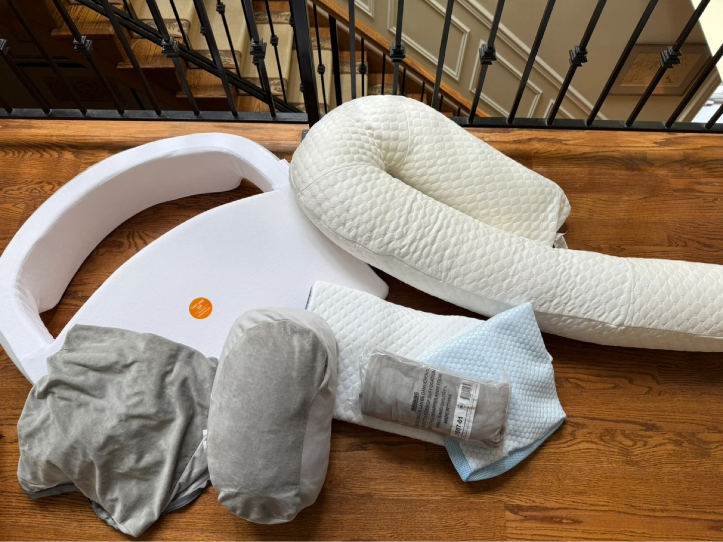 Various therapeutic pillows with covers, all new and unused.
