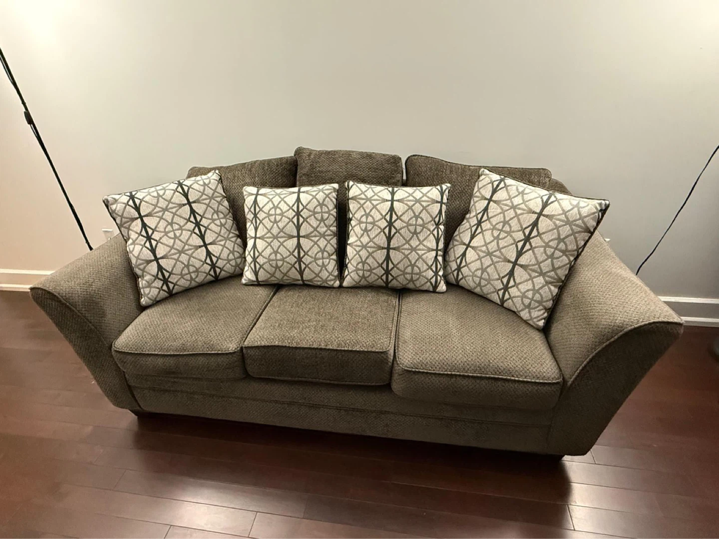Brown Sofa with Decorative Pillows 🌱