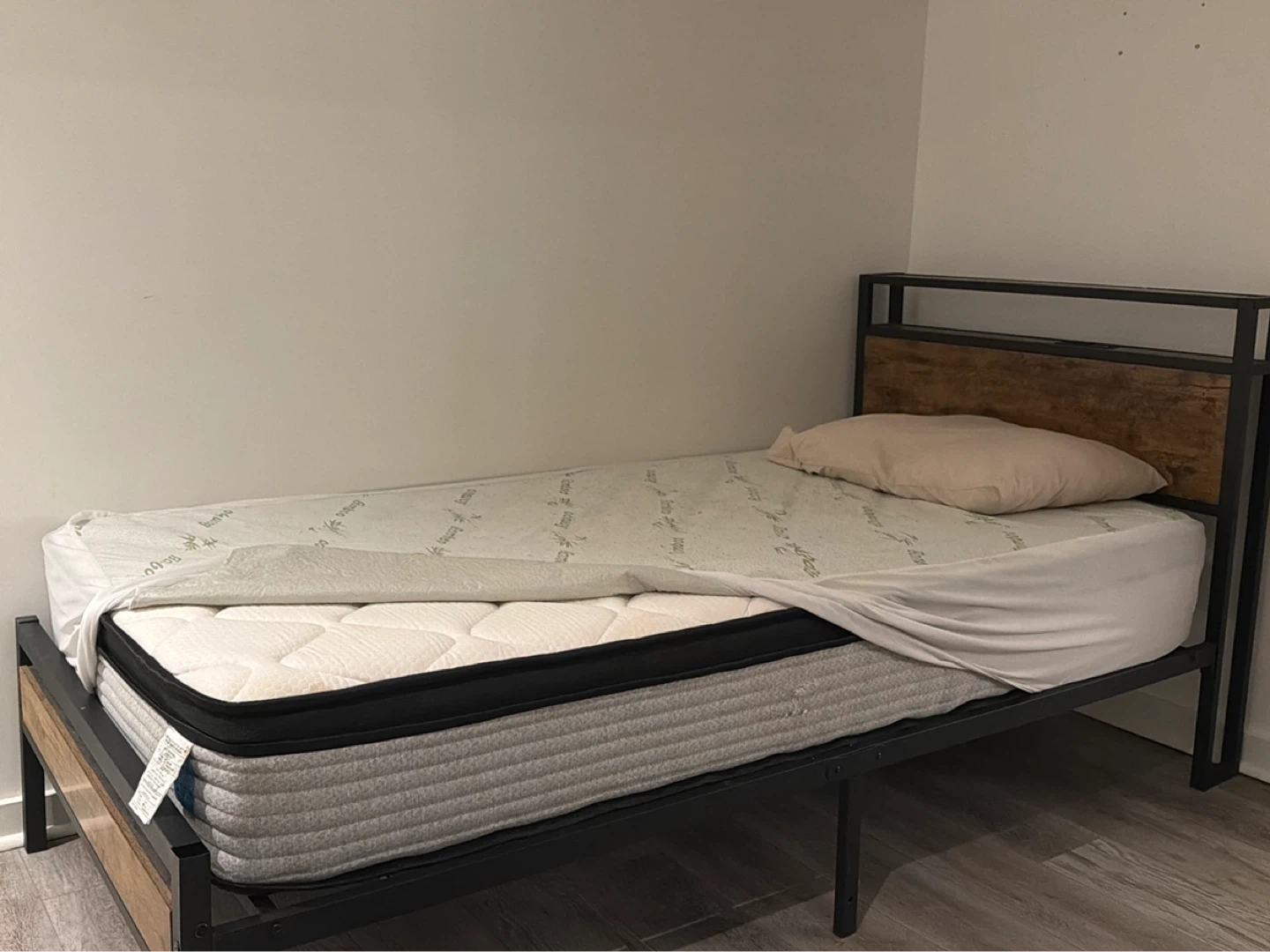 Single bed comes with mattress and mattress spill protector