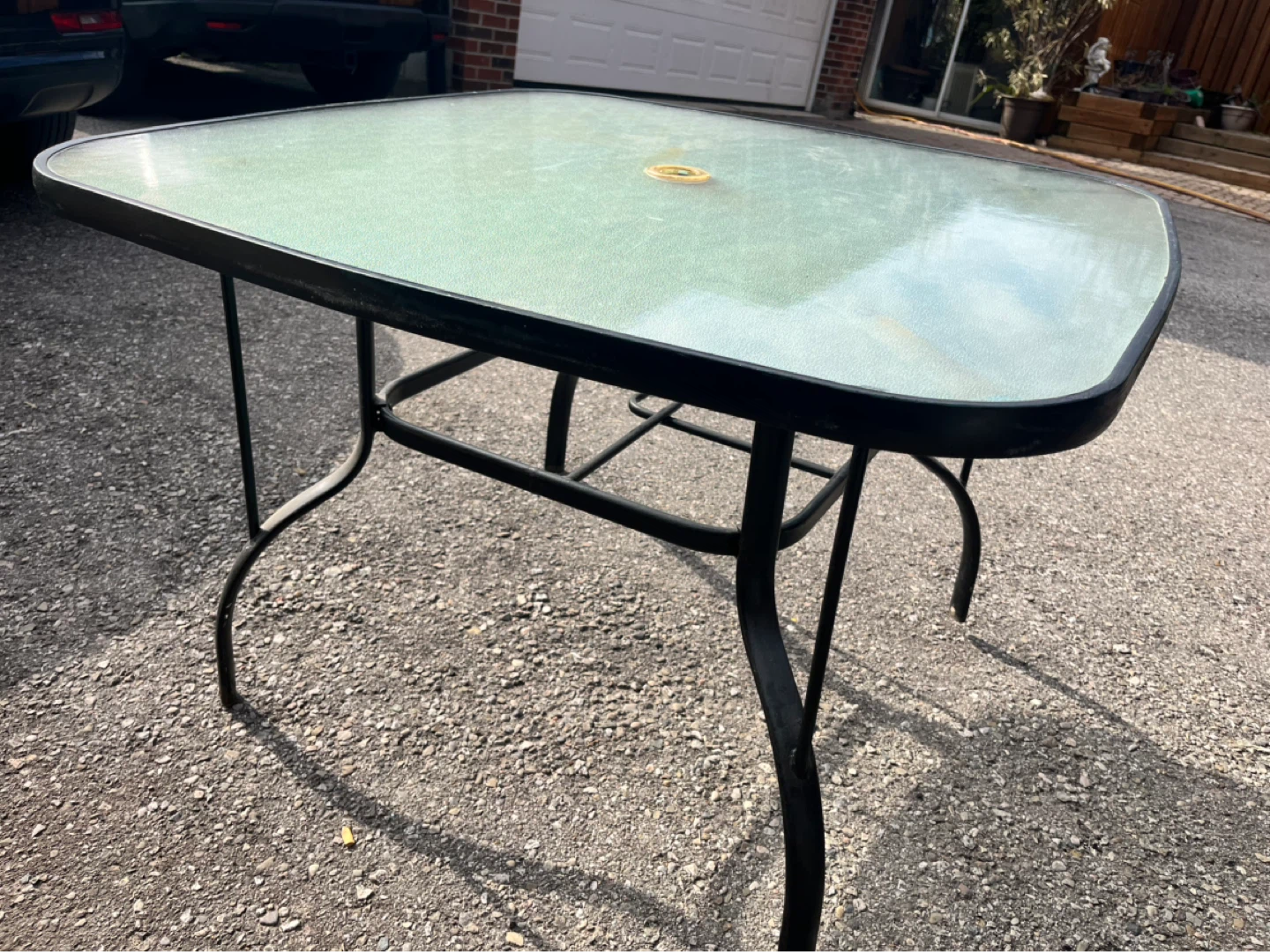 MOVING SALE ‼️ Glass Top Patio Table - photo 2